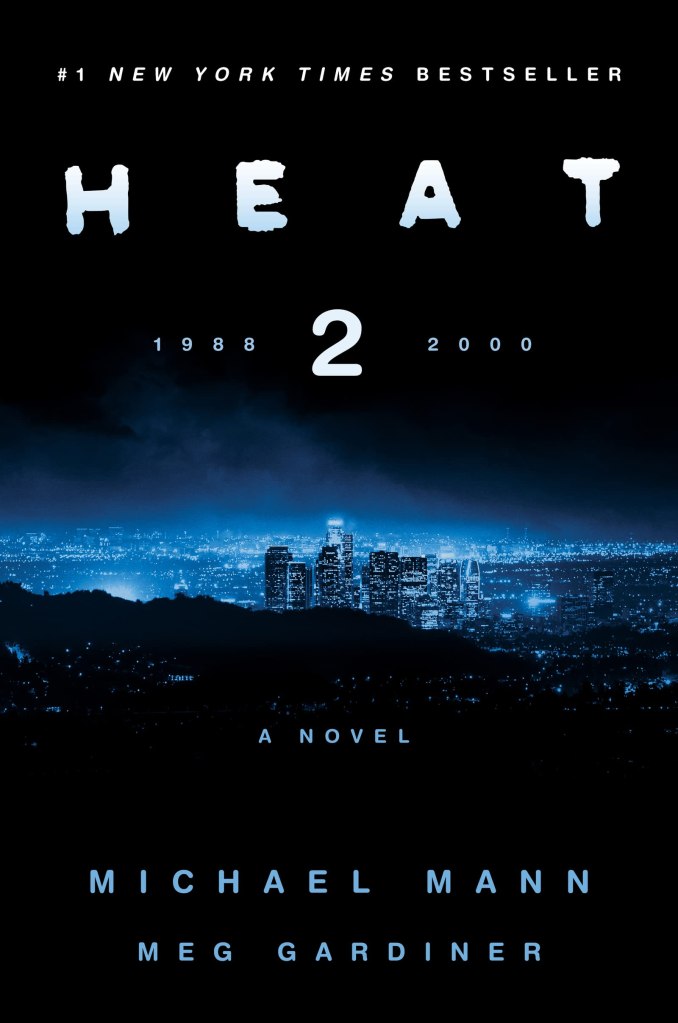Cover for "Heat 2" showing the Los Angeles skyline